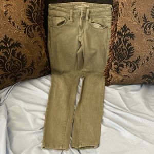 Green mid rise skinny jeans in women with the size 00/24R brand universal thread